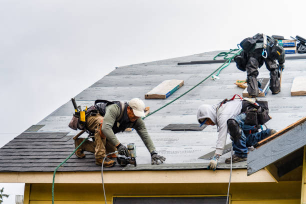 Professional Roofing technician working in Clinton, MA